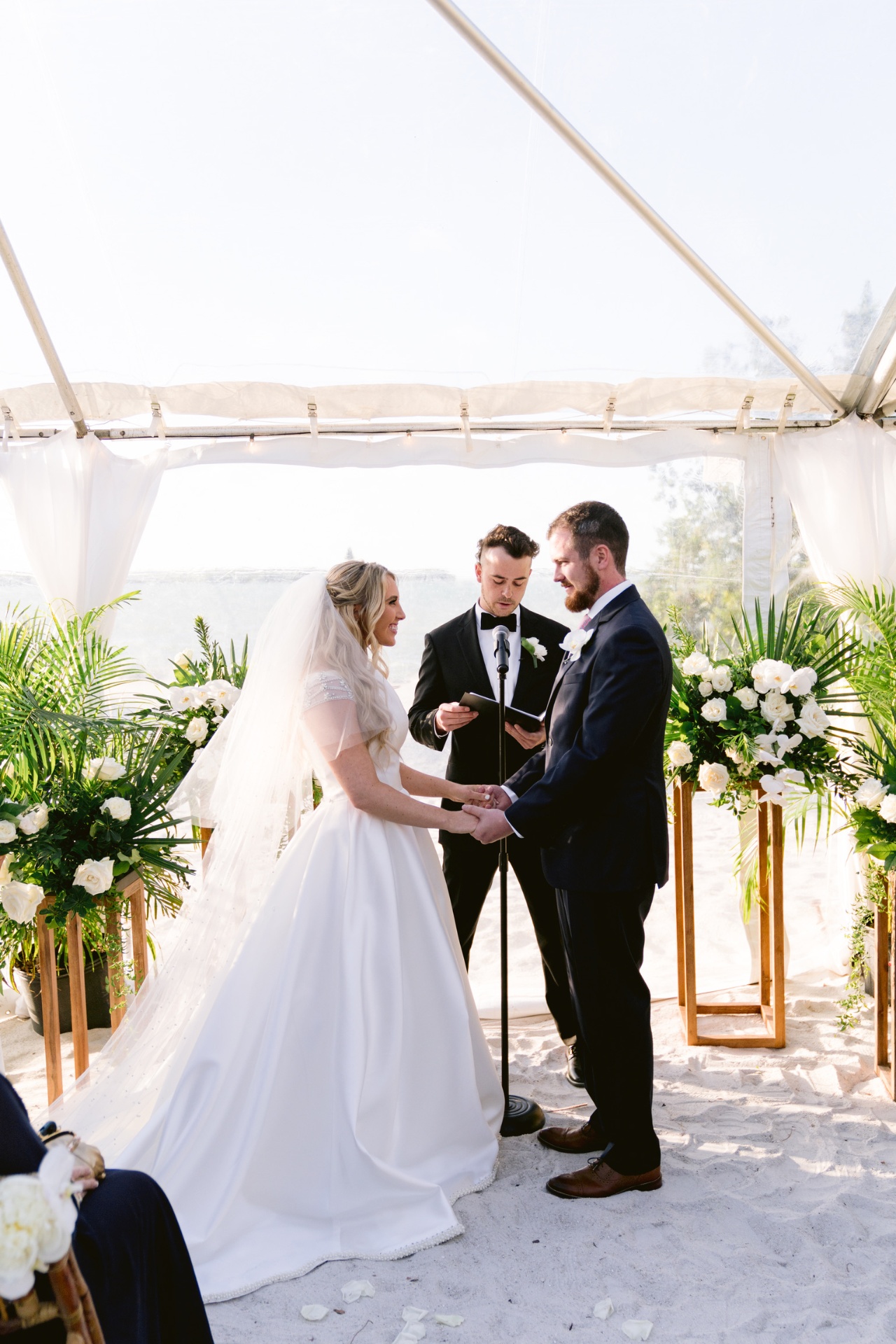 Shane officiating a beach wedding ceremony